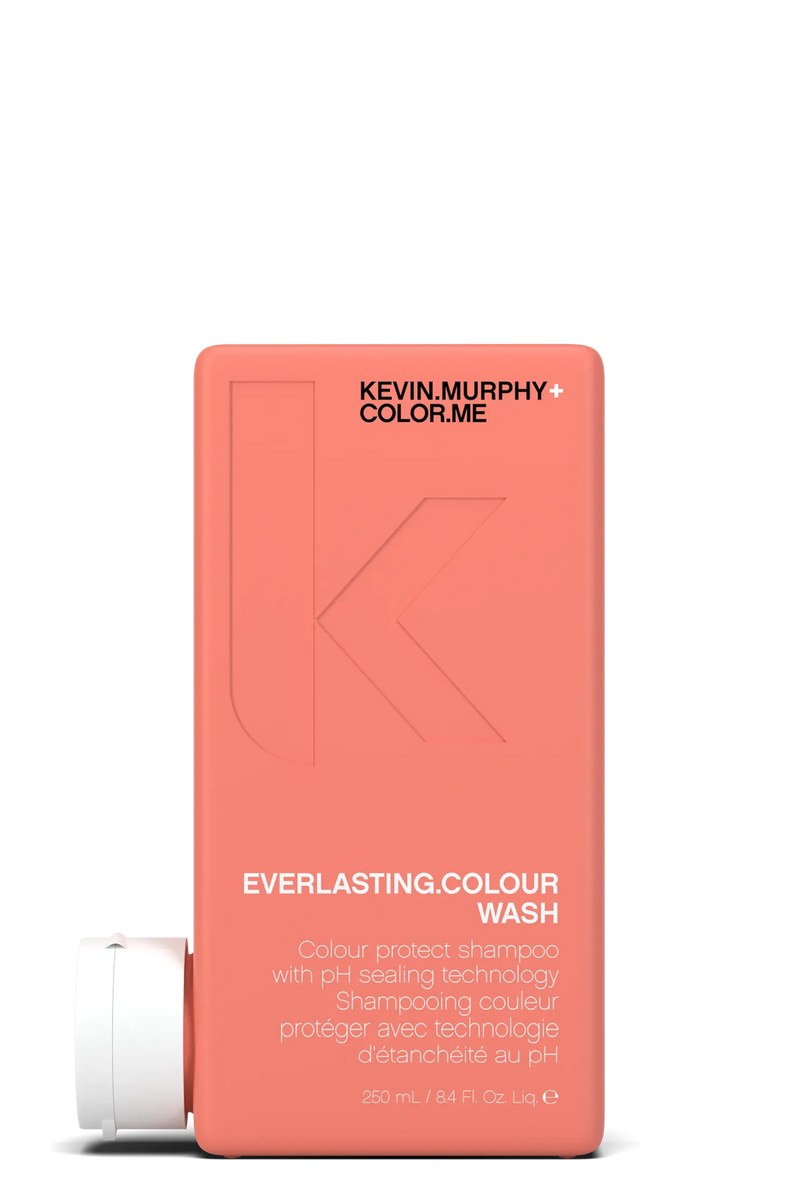 Kevin Murphy shampoo bottle with coral packaging on a white background