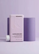 Kevin Murphy Blonde Angel Wash shampoo bottle on a light purple background - Hair Care Canada