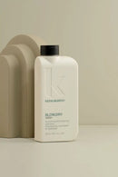 Kevin Murphy shampoo bottle on a beige background - Hair Care Canada